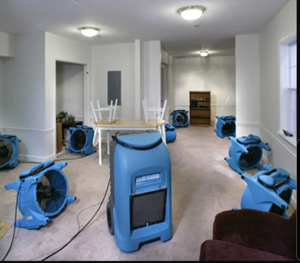 Air movers and dehumidifier setup for Water Damage Restoration in Lochbuie